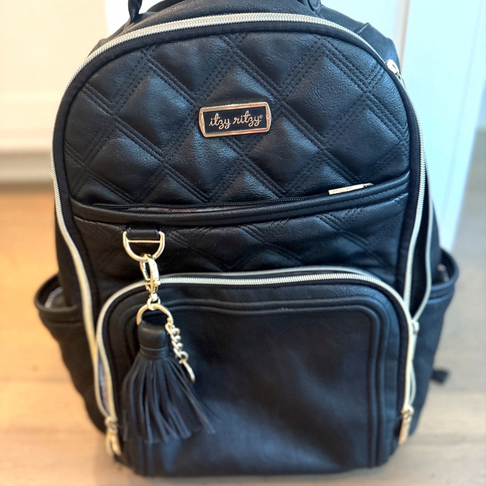 Itzy Ritzy Boss Plus Diaper Bag | Quilted Black Backpack with Gold Accents